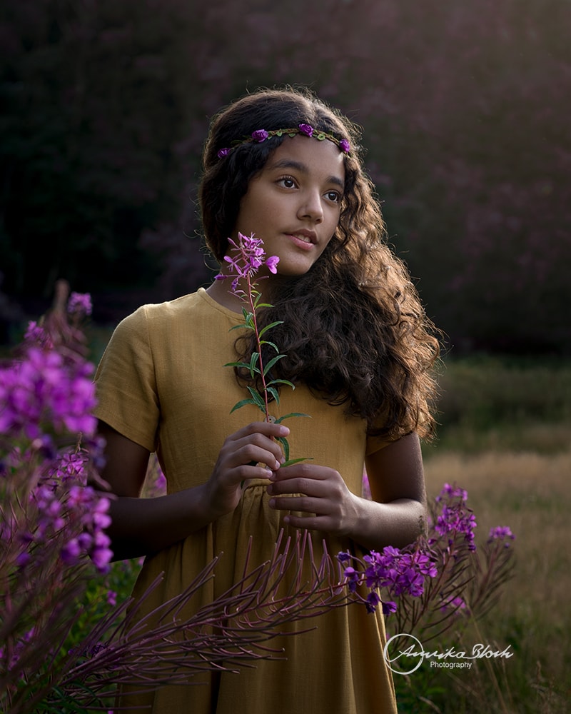 Fine art child portrait photography, girl surrounded by nature